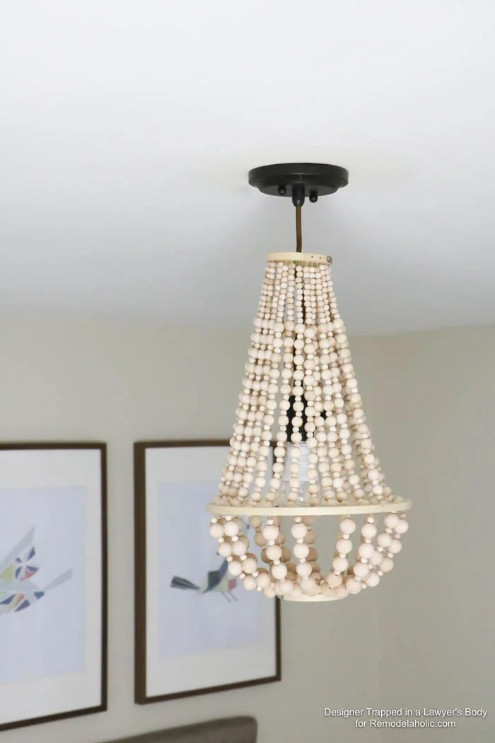 WOW! Come learn how to make your own wood bead chandelier with this solid walkthrough by Designer Trapped in a Lawyer's Body for Bekob.com!