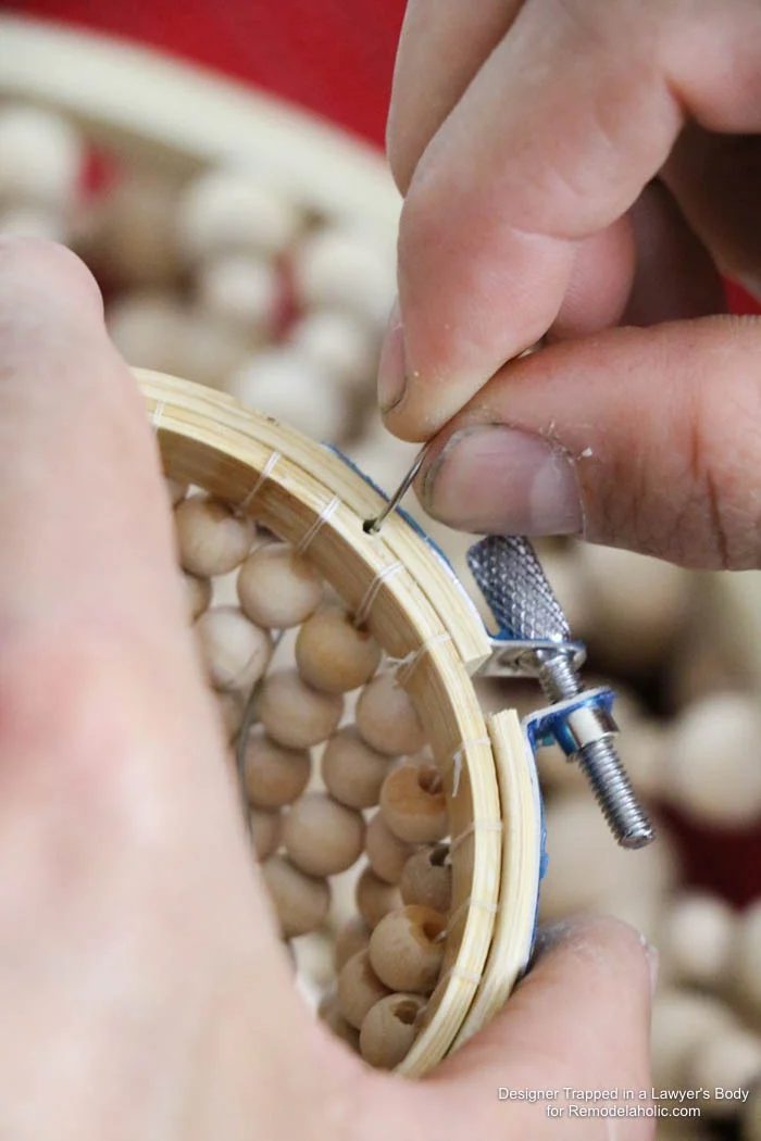 WOW! Come learn how to make your own wood bead chandelier with this solid walkthrough by Designer Trapped in a Lawyer's Body for Bekob.com!