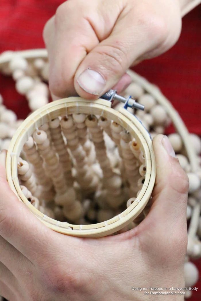 WOW! Come learn how to make your own wood bead chandelier with this solid walkthrough by Designer Trapped in a Lawyer's Body for Bekob.com!
