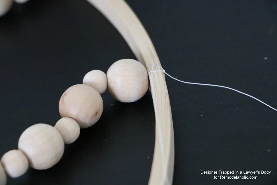 WOW! Come learn how to make your own wood bead chandelier with this solid walkthrough by Designer Trapped in a Lawyer's Body for Bekob.com!