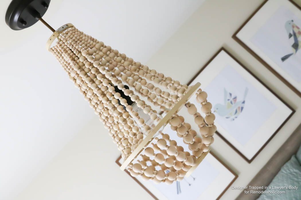 WOW! Come learn how to make your own wood bead chandelier with this solid walkthrough by Designer Trapped in a Lawyer's Body for Bekob.com!