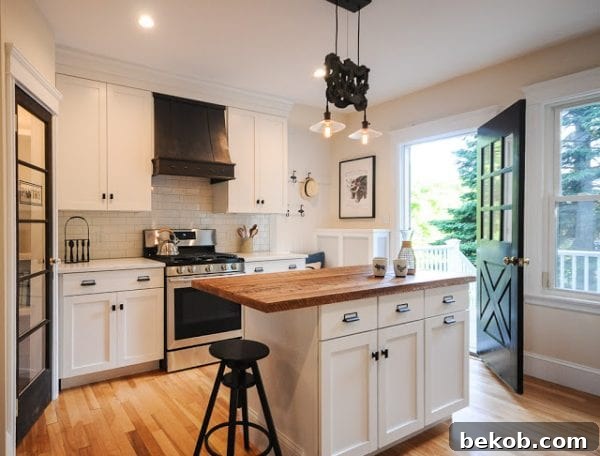 After: Total Kitchen Remodel with Custom Range Hood and Reclaimed Wood Island
