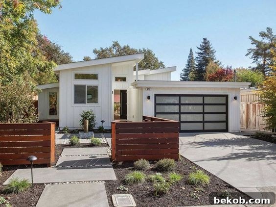 Mid-century modern home with extensive decking and natural landscaping