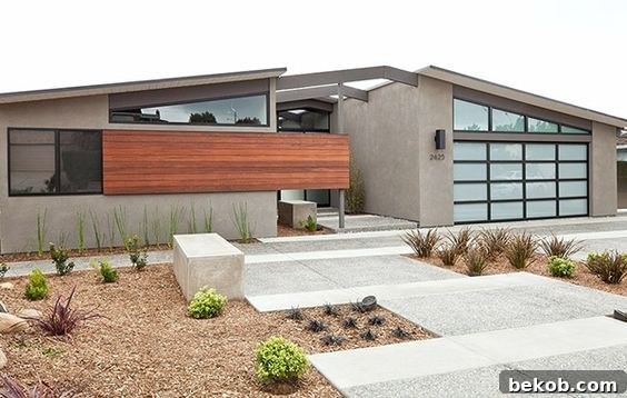 Renovated mid-century modern exterior demonstrating updated materials and improved curb appeal