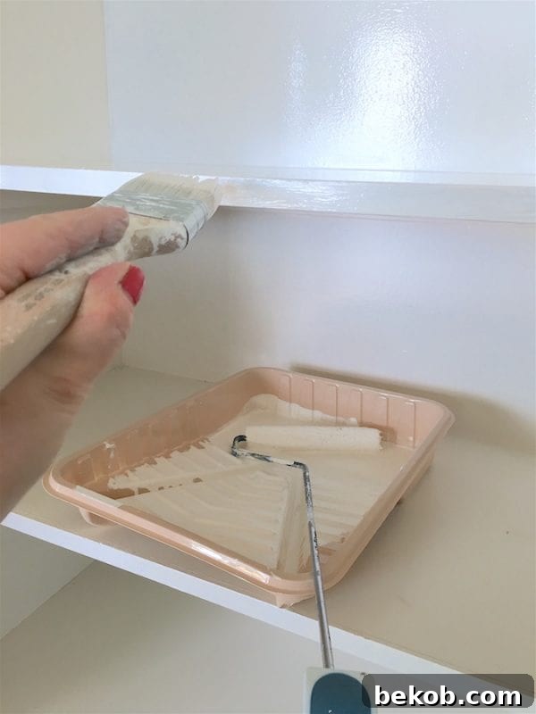 Pantry Makeover: Freshly Painted Shelves by Refined Rooms