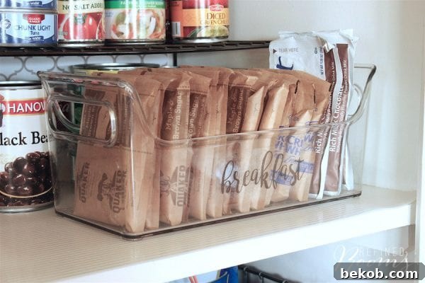 Pantry Organization Using Clear Bins and Hand-Lettered Labels by Refined Rooms