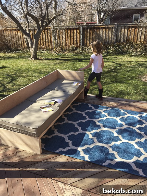The newly installed DIY outdoor sectional sofa with Better Homes and Gardens for Walmart cushions, showing the empty rug space