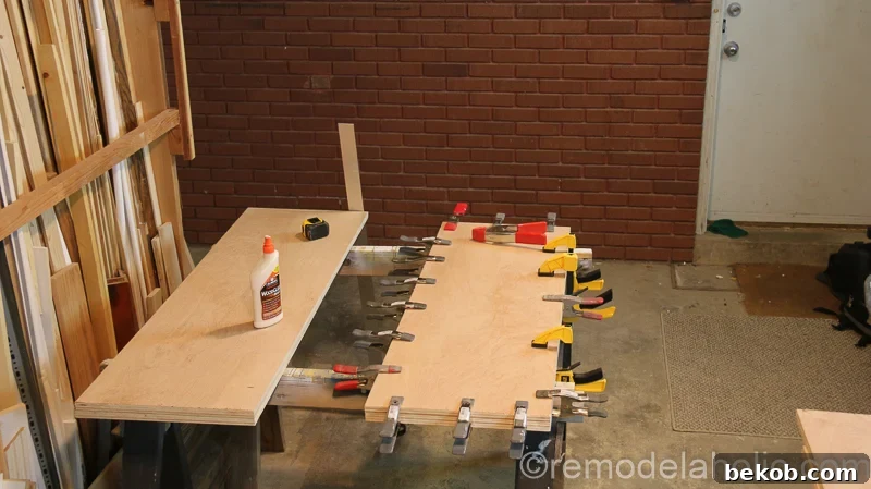 DIY Waterfall Plywood Console Table @remodelaholic 11