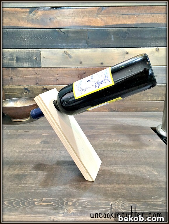 Clever Plywood Scrap Builds 11 A clever balancing wine bottle holder made from plywood scraps, a unique and impressive gift or display piece for wine enthusiasts.