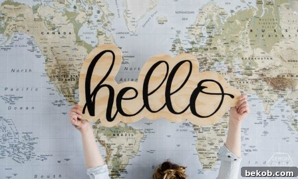 Personalize your entryway with a hand-lettered 'Hello' sign made from plywood, offering a warm and inviting welcome.