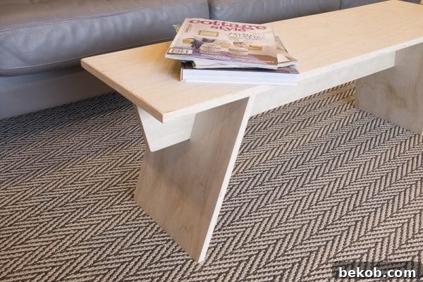 Angled Leg Plywood Bench by Remodelaholic for a modern look