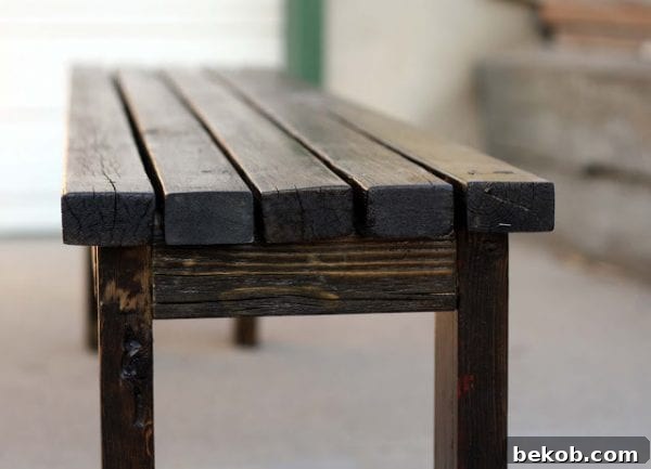 Creative scrap wood bench made from leftover 2x4s and other lumber, showcasing resourceful DIY.