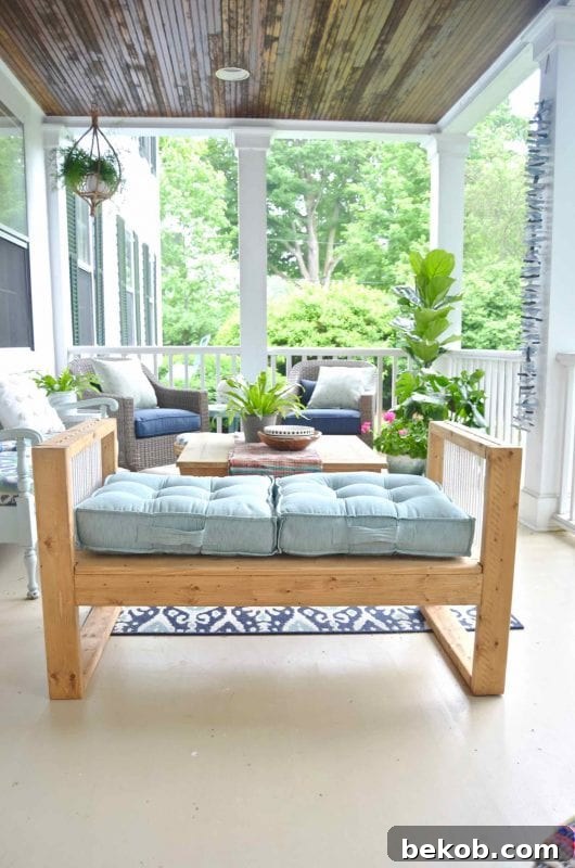Mid-century modern inspired outdoor rope bench crafted from 2x4s. Combines wood and rope for a stylish seating option.