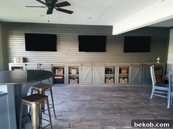 Sliding Barn Door Entertainment Center man cave idea from Diva of DIY on Remodelaholic
