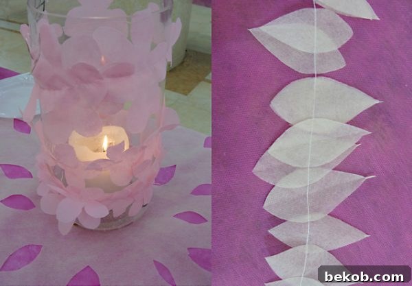 A vibrant spring flower garland cascading vertically, made from disposable tablecloths, highlighting its colorful and flowing design.