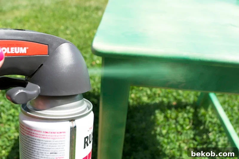 Furniture Painting Demystified: 5 Paint Choices 10 Spray Painting Furniture, showing the technique of applying a light and even coat of spray paint.