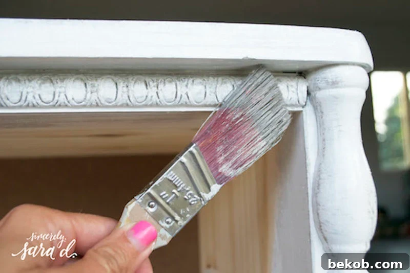 Furniture Painting Demystified: 5 Paint Choices 12 Adding Gray Copy, showing a smooth, glossy finish achieved with oil-based paint on furniture.