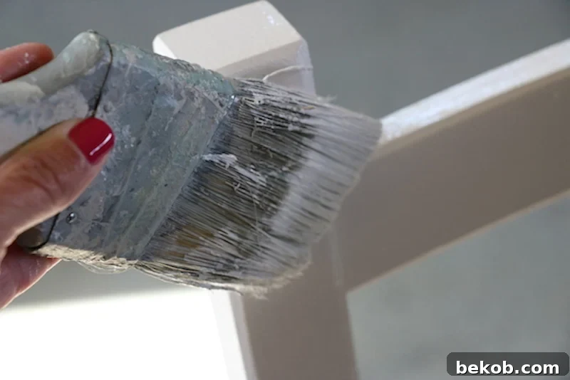 Furniture Painting Demystified: 5 Paint Choices 4 Latex Paint On Furniture, demonstrating a smooth, even application of latex paint on a furniture piece.