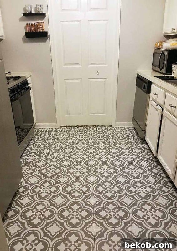Stenciled linoleum flooring transformed to look like concrete tiles