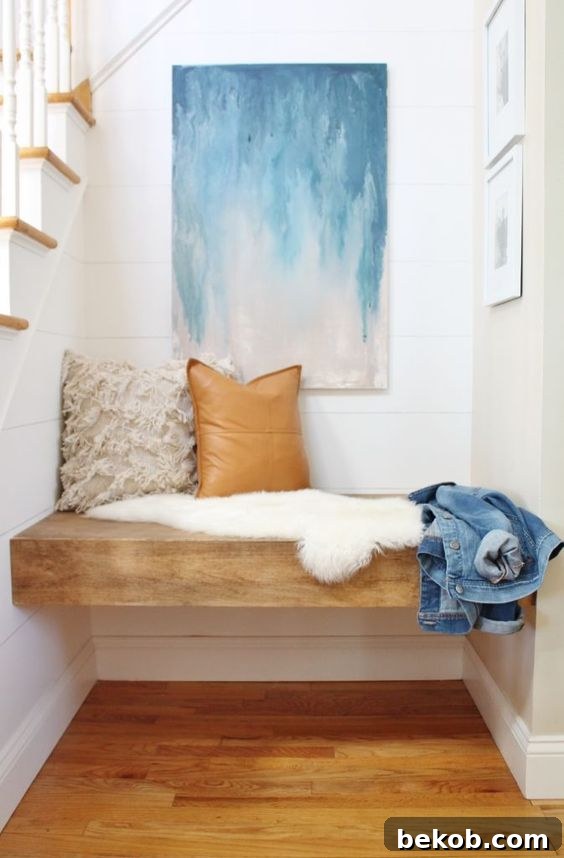 Built-in bench and shelves transforming an awkward nook into a functional and stylish reading corner. Excellent space-saving ideas for small living areas.