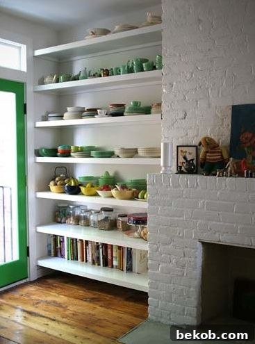 Organized open shelving in a narrow wall niche, showcasing decorative items and practical storage solutions. Maximizing vertical space in small or awkward areas.