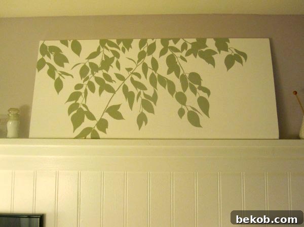 Completed custom leaves painting installed in a bathroom