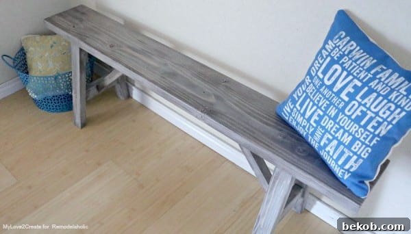 Build a DIY Wood Bench with a Rustic Farmhouse Stain, featuring a top-side view by MyLove2Create