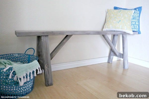 Easy DIY Wood Bench Plans featuring a gorgeous Farmhouse Wood Finish by Remodelaholic, low angle shot