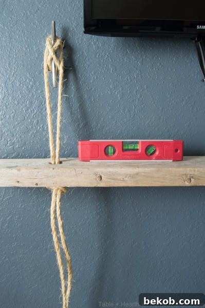 Leveling shelf board after tying rope knot