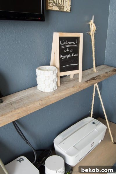 Guest room decor with coastal floating shelves