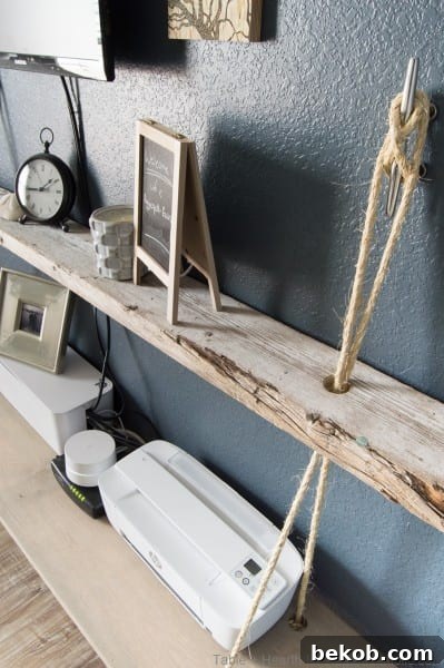 Details of reclaimed wood on floating rope shelf
