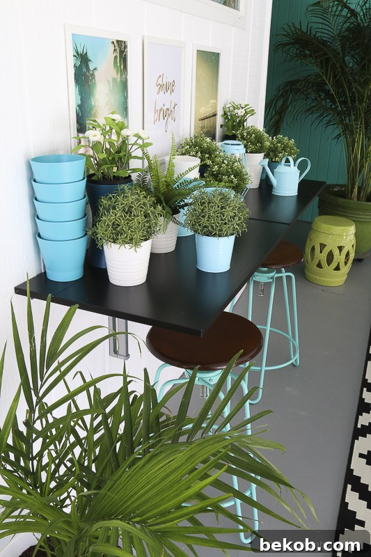 After: Outdoor Dining Room with IKEA Furniture. Serving bar with plants and framed prints.