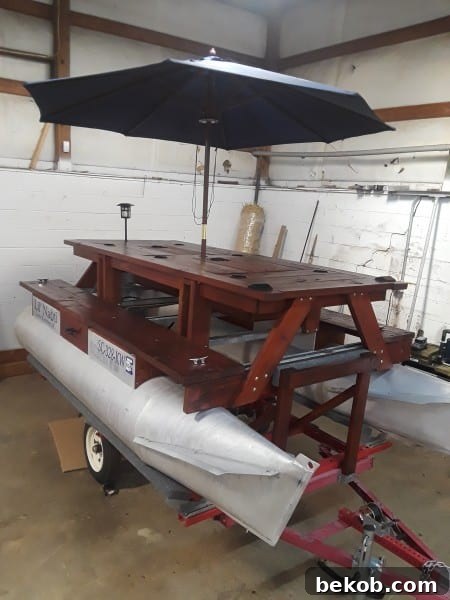 By Steve, Patio Table With Built In Cupholders, Insulated Cooler Boxes, And Solar Lights #remodelaholic