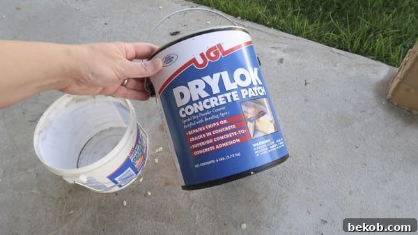Applying First Coat of DRYLOK Concrete Patch to Repair Cracks