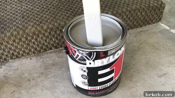 Mixing DRYLOK Non-Skid Texture Additive into Epoxy Paint
