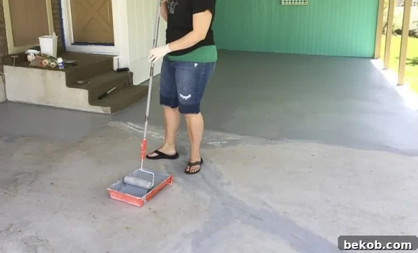 First Coat of DRYLOK Epoxy Paint Drying on Concrete Patio
