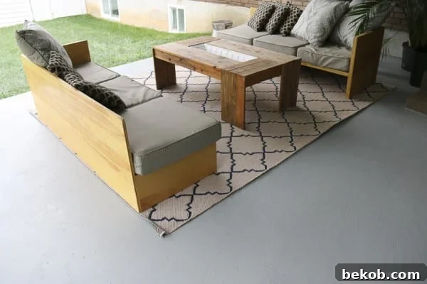Transformed Painted Concrete Patio with New Furniture and Decor