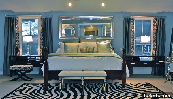 Master bedroom with new zebra print rug and updated decor