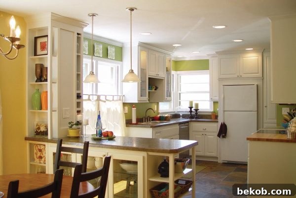 White kitchen renovation and remodel with improved lighting