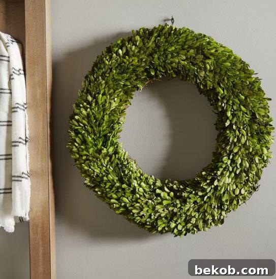 A beautiful neutral greenery wreath perfect for everyday home decor