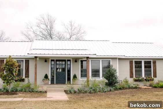 Modern ranch exterior with natural wood accents and clean lines. An excellent example for ranch home curb appeal inspiration.