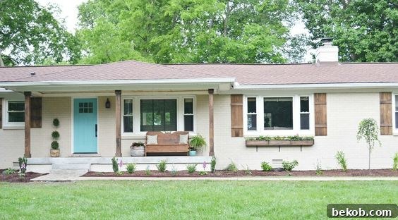 Charming ranch house exterior with inviting landscaping and a welcoming front porch, ideal for curb appeal transformation projects.