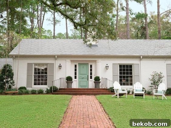 Elegant ranch exterior with a focus on landscaping and lighting, providing examples for boosting curb appeal.
