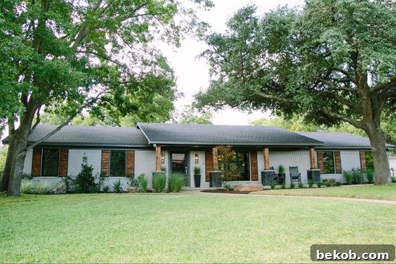 Farmhouse style ranch exterior showcasing warm tones and welcoming elements, perfect for a ranch home transformation.