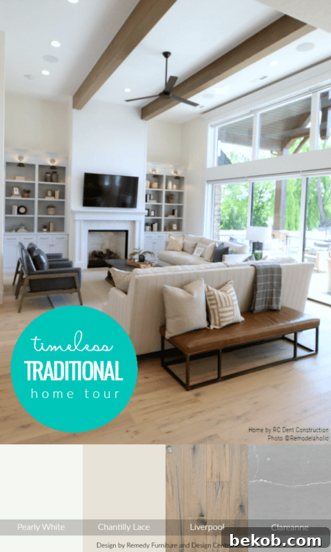 Timeless Traditional Home Tour: A showcase of paint colors and finishes in a beautiful custom home with exposed wood ceiling beams, a white kitchen, and a marble master bath suite.