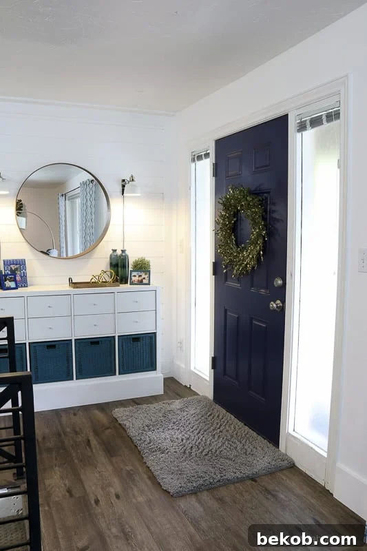 26 Expert Tips for How to Paint Interior Doors -- The Right Way, The First Time! This FAQ for painting doors includes whether to use a brush vs. a roller, how to paint common affordable 6-panel hollow core doors, and how to get a smooth finish on a faux wood grain door. Achieve a professional finish on your interior doors with Remodelaholic's guide. #remodelaholic #doorpainting #DIYhome