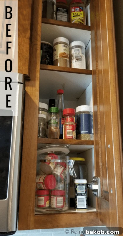 Organized Spice Cupboard Makeover To A Wall Mounted Wire Spice Rack, Modern Farmhouse Style #remodelaholic