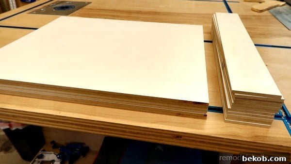 Cut Melamine Dividers And Spacers For Over The Fridge Cabinet Organizer #remodelaholic