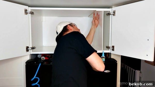 Use DAP Rapid Fuse Glue To Secure Cabinet Organizer Dividers #remodelaholic
