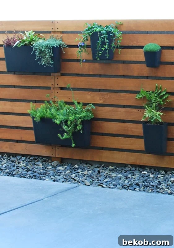 Diy Wood Slat Planter Wall Over Concrete Block Fence, The Garden Glove Featured On Remodelaholic